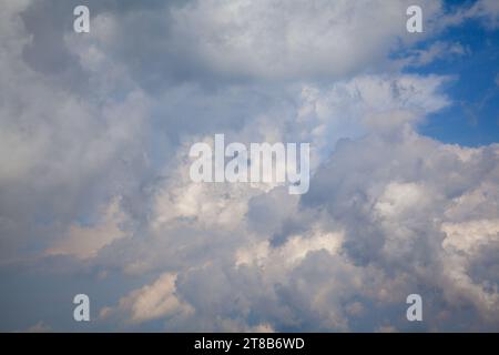 sky, sunlit clouds, white and blue clouds Stock Photo