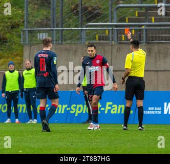 sports, football, Regional League West, 2023/2024, Wuppertaler SV vs. 1. FC Bocholt 1-2, scene of the match, f.l.t.r. Lukas Demming (WSV), red card to Kevin Pytlik (WSV), referee Cengiz Kabalakli Stock Photo