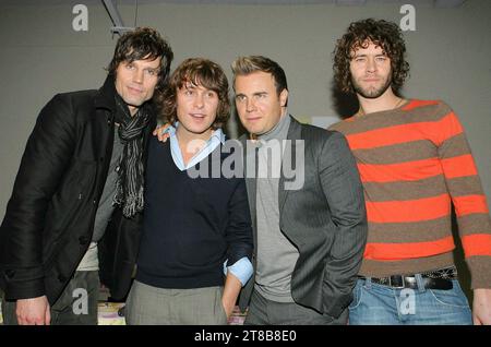 British pop band Take That meet their fans at HMV in Manchester, UK, after reforming without Robbie Williams. Stock Photo