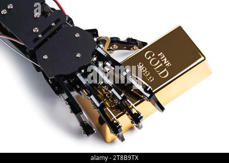 Real robotic hand with gold bullion bars. Concept of Artificial intelligence in banking and investment business Stock Photo