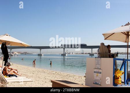 people enjoying arabian sea beach at abu dhabi Stock Photo