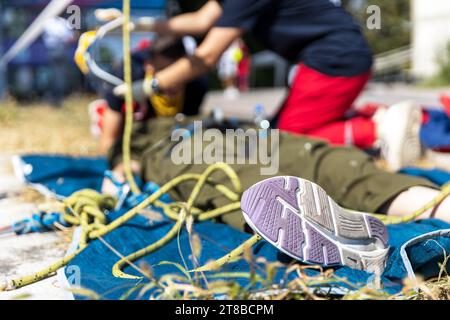First aid after accident at work. Window washer fall. Stock Photo