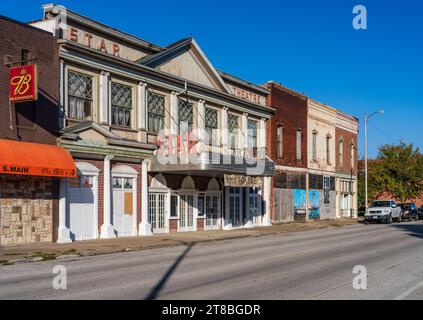 Hannibal, MO - 20 October 2023: View down Main street with empty abandoned theater and shops in Missouri Stock Photo