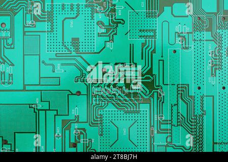 Background of printed circuit board without chips and components Stock Photo