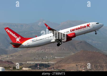 A Corendon Airlines Boeing 737-800 taking off from Tenerife Sur-Reina Sofía. Corendon Airlines Europe is based in Malta and with Corendon Airlines and  Corendon Dutch Airlines belongs to Touristic Aviation Services. Stock Photo