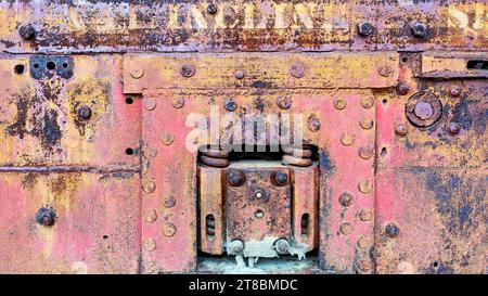 Industrial grunge rusty metal background texture with faded yellow and red paint Stock Photo