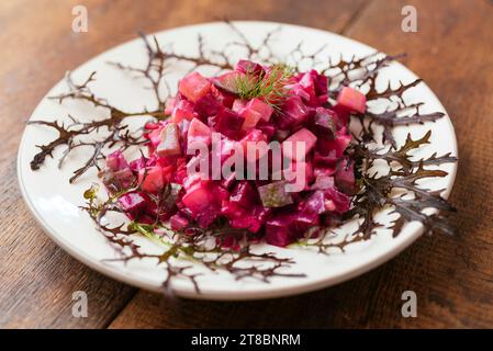 Traditional Finnish beetroot salad with potatoes, apples, carrots and pickles. Stock Photo