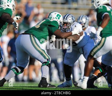 November 18, 2023: Rice University junior De'Braylon Carroll (55) rushing the quarterback. NCAA football game between Rice University and University of North Carolina-Charlotte, at Jerry Richardson Stadium, Charlotte, North Carolina. David Beach/CSM Stock Photo