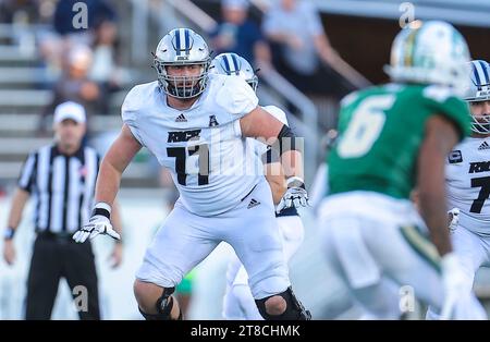 November 18, 2023: Rice University senior Brant Banks (77) pass blocks. NCAA football game between Rice University and University of North Carolina-Charlotte, at Jerry Richardson Stadium, Charlotte, North Carolina. David Beach/CSM Stock Photo