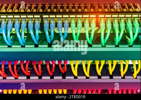 Network cables in switch and firewall in cloud computing data center server rack Stock Photo