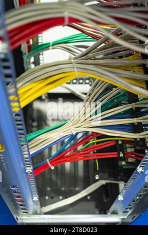 Network cables in switch and firewall in cloud computing data center server rack Stock Photo