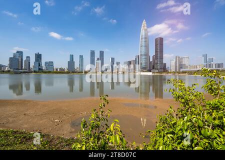 Park in city of Shenzhen China,beautiful mix of green trees combined with buildings, modern architecture Stock Photo