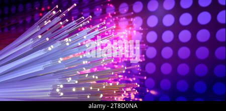 Fiber optics network cable on technology background Stock Photo