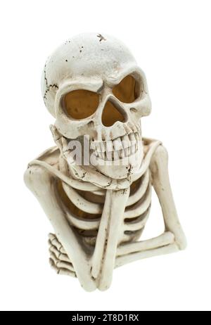 skull sitting and thinking isolated on white background Stock Photo