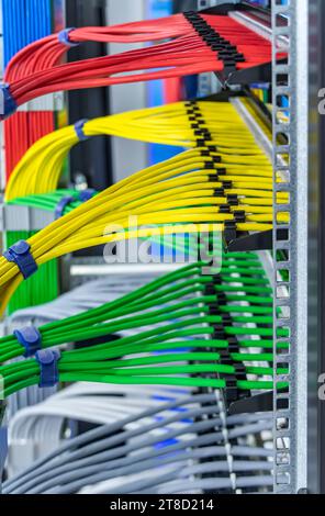 Information Technology Computer Network, Telecommunication Ethernet Cables Connected to Internet Switch. Stock Photo