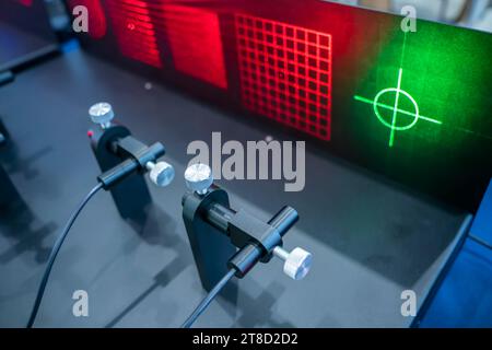 laser on optical table in physics laboratory Stock Photo