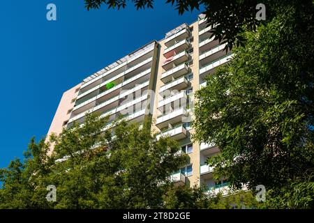 Warsaw, Poland - June 20, 2021: Communist large scale residential building with balconies at Batorego street in Mokotow district of Warsaw Stock Photo