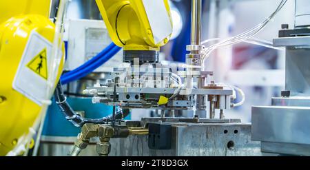 automated arm catch for assembly line. The robot for smart technology manufacturing process. Stock Photo