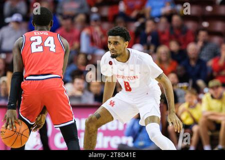 Houston guard Mylik Wilson (8) drives up court against Texas Tech guard ...