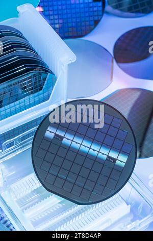 Silicon Wafer Under Cleanroom Fabrication in plastic holder box Stock Photo