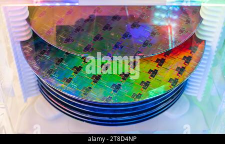 Silicon Wafer Under Cleanroom Fabrication in plastic holder box Stock Photo