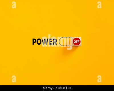 Power off slider button on yellow background. Overwhelmed, weakness, impotence or powerless concept. Stock Photo