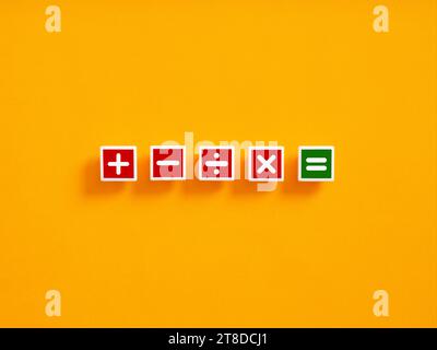 Basic mathematical operations symbols. Plus, minus, multiply, divide, equal symbols on colorful blocks. Mathematic or math action, education and basic Stock Photo