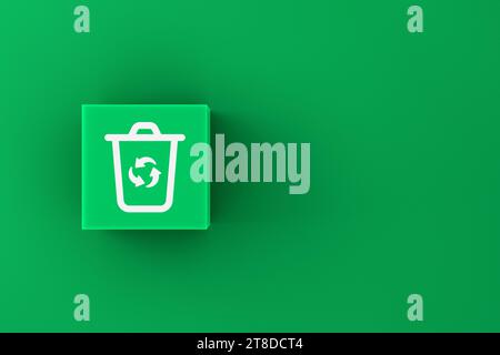Recycling and environmental protection concept. Recycle bin symbol on green button on a green background. Stock Photo