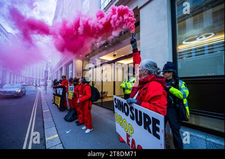 London, UK. 20th Nov, 2023. Protest outside Sinosure, Chinese export credit agency to call on them to rule out insuring the East African Crude Oil Pipeline (EACOP). This is an action in solidarity with climate groups over the world but especially in Uganda and Tanzania. There have already been 27 banks and 23 insurers who have ruled out financing the pipeline. Credit: Guy Bell/Alamy Live News Stock Photo