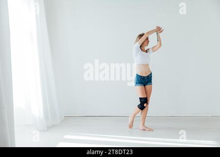 a woman dancing in a dance studio in a dance hall in a dance studio Stock Photo