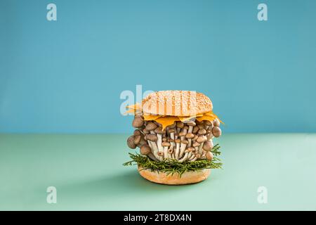 Autumn food concept. Burger with mushrooms. Creative still life Stock Photo