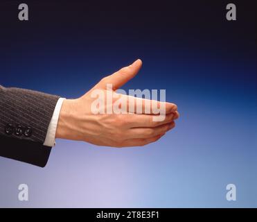 Outstretched Hand for handshake. Stock Photo