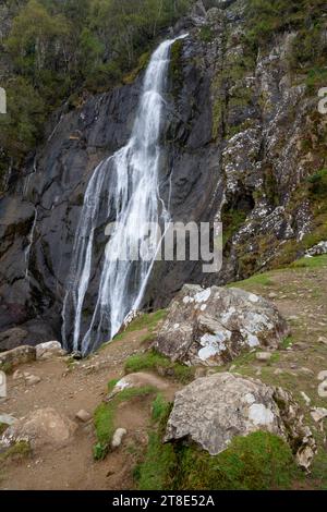 Aber Falls a dramatic waterfall on the edge of the Carneddau mountains in Snowdonia national park, North Wales. Stock Photo