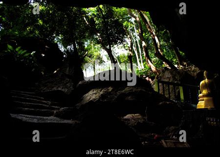 Interior inside cavern of Wat Tham Nam or Water Cave Temple for thai ...