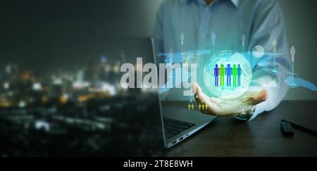 Customer relationship management concept. Businessman uses computer to access global customer network management technology. Managing customers using Stock Photo