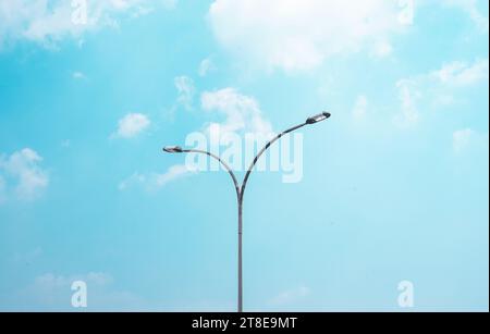 street lamp with bright blue sky as background Stock Photo