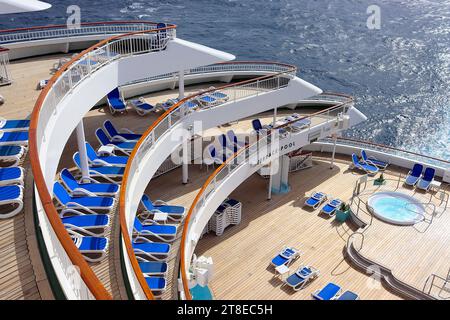 The 4 unique sweeping stern decks overlooking the whirlpool spas and Terrace Pool on the P&O cruise ship Aurora en route from La Palma to Tenerife. Stock Photo