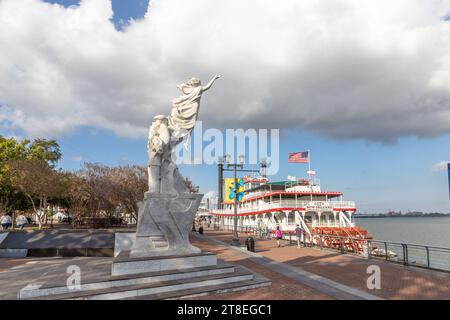 New Orleans, USA - October 24, 2023: Steamboat city of new orleans at the pier  at Mississippi River near the Monument To The Immigrant. The steamboat Stock Photo