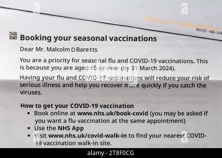 Letter from NHS reminder for booking seasonal vaccinations, Covid-19 and flu vaccines vaccine Stock Photo