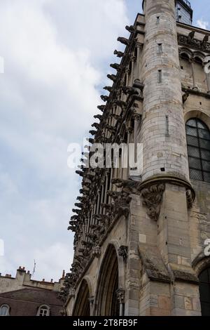 Western facade of Eglise Notre-Dame de Dijon (Church of our Lady), with triple frieze in the form of metopes bearing the fifty-one false gargoyles Stock Photo