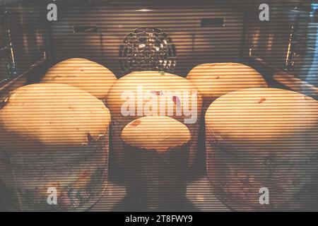 Traditional yeast Easter bread is baked in the oven. Easter cake Stock Photo