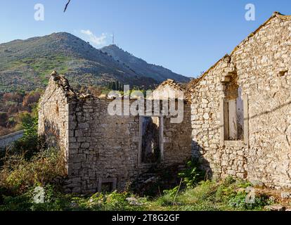 Ruined building in the partially abandoned village of Old Perithia (Palea Peritheia) on the high slopes of Mt Pandokratoras in Corfu Greece Stock Photo