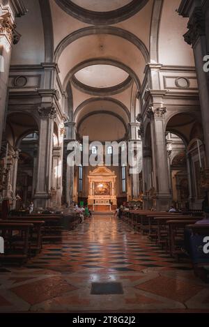 Tranquil and serene interior of a peaceful church with beautiful arches and quiet atmosphere Stock Photo