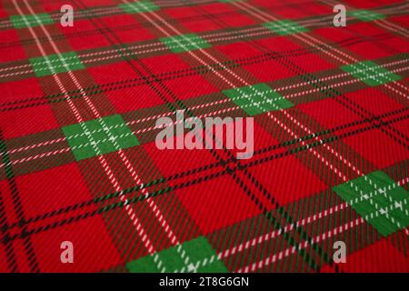 Traditional Christmas tablecloth, defocused backdrop, side view soft focus close up, for product Stock Photo