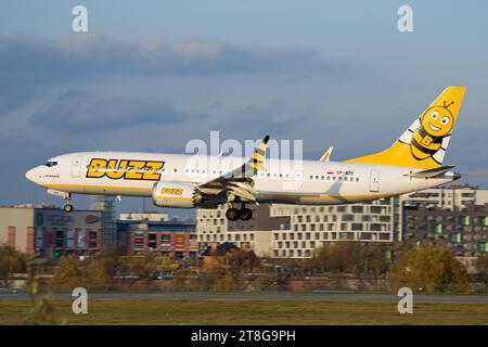 Ryanair's Polish airline Buzz Boeing 737 MAX 8-200 landing at Lviv Airport during a golden hour Stock Photo