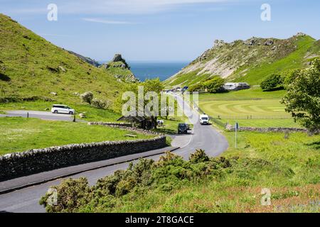 Sun shines on the rugged cliffs of the Valley of Rocks at Lynton on the Exmoor coast of North Devon. Stock Photo