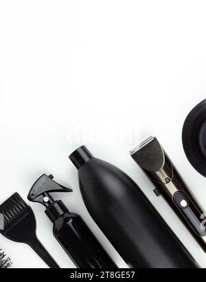 Professional items for a hairdressers, haircuts on a white background. Composition with scissors, other hairdresser's accessories on white background. Stock Photo