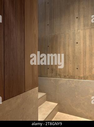 Stone treads and concrete wall. Hotel Casa Polanco, Mexico City, Mexico. Architect: Gantous Arquitectos, 2022. Stock Photo
