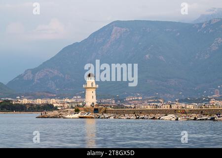 Lighthouse and Marina in Alanya, Turkish Riviera on Mediterranean Coast, Antalya, Turkey Stock Photo