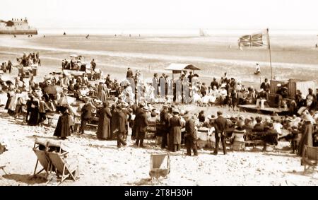Pierrots on the beach in Morecambe, Victorian period Stock Photo